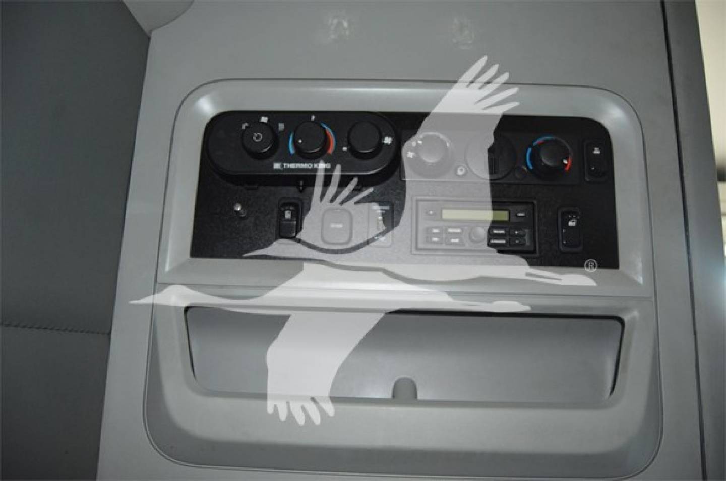 Kenworth T680 truck interior console with climate controls and a small display; visible text includes 'ICE THERM', various knobs, and a panel.