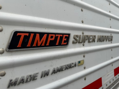 Timpte Super Hopper trailer side showing TIMPTE logo and MADE IN AMERICA lettering.