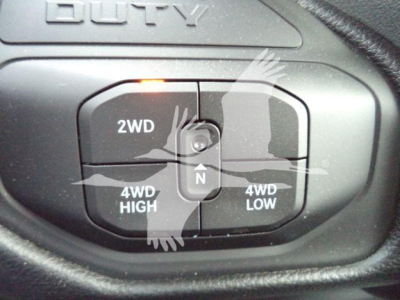 Ram 5500 dashboard control showing 2WD, 4WD HIGH, 4WD LOW, and neutral shift indicator.
