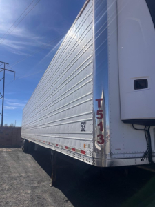 Great Dane air ride reefer trailer side view showing T513 vertical lettering and 53' length markings.