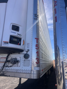 Great Dane air ride reefer trailer side with Thermo King or similar unit, showing model 7300 X on front panel and T513 vertical marking.