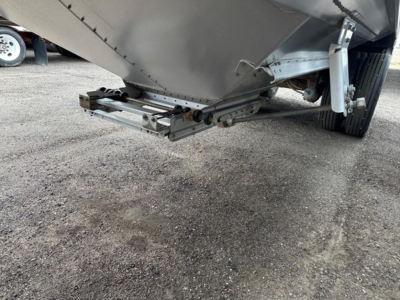 Trailer: Timpte hopper 66 inch side with rear hitch and underside components visible.