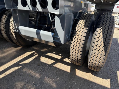 Ranco LW21-40 trailer rear axle and dual wheels showing heavy-duty tires and undercarriage components.