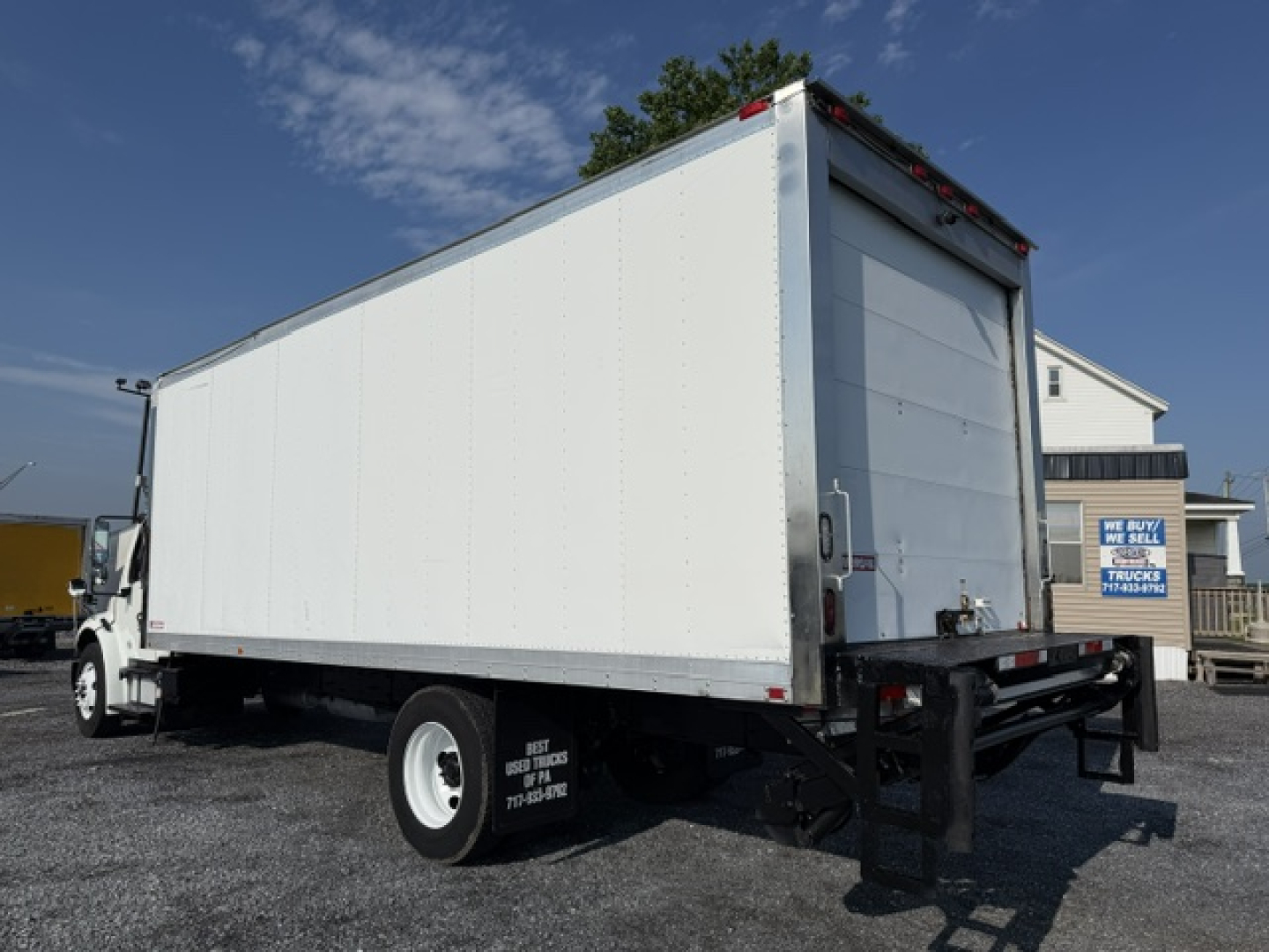 Freightliner M2-106 refrigerated truck 2016 rear view showing cargo box and rear liftgate.