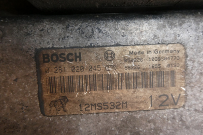 Bosch label on equipment showing 12V and part numbers: BOSCH Made in Germany, 12MS532M, 12V, barcodes and serial numbers.