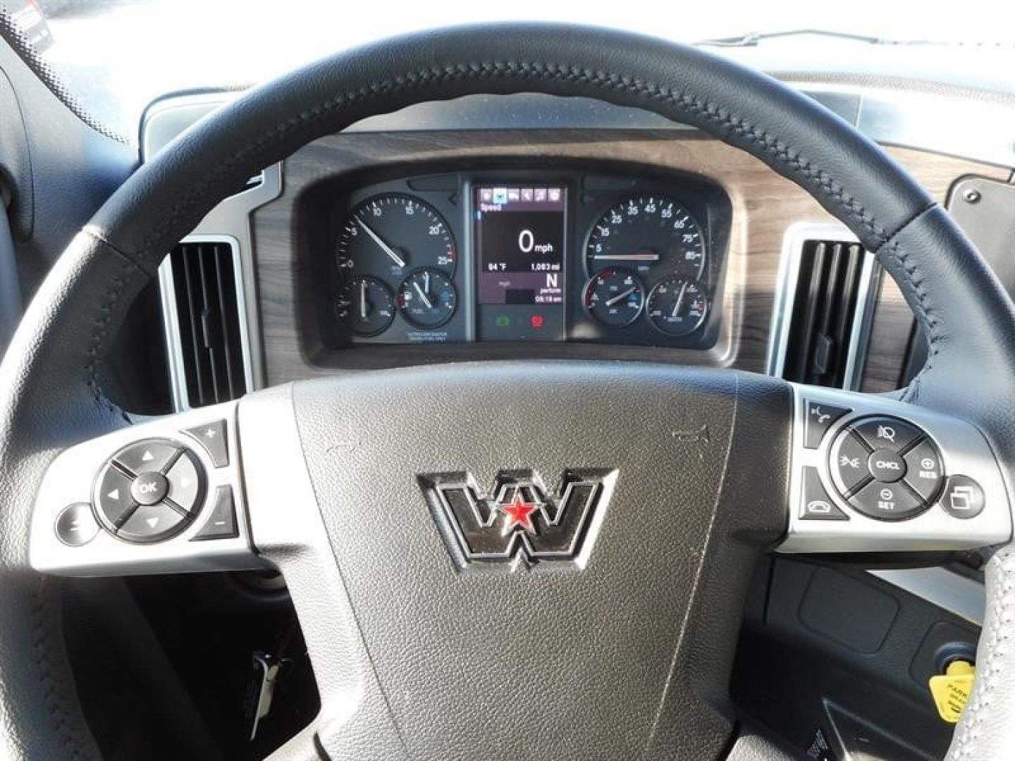 Steering wheel cockpit of a Western Star 47X showing instrument cluster and steering wheel controls.