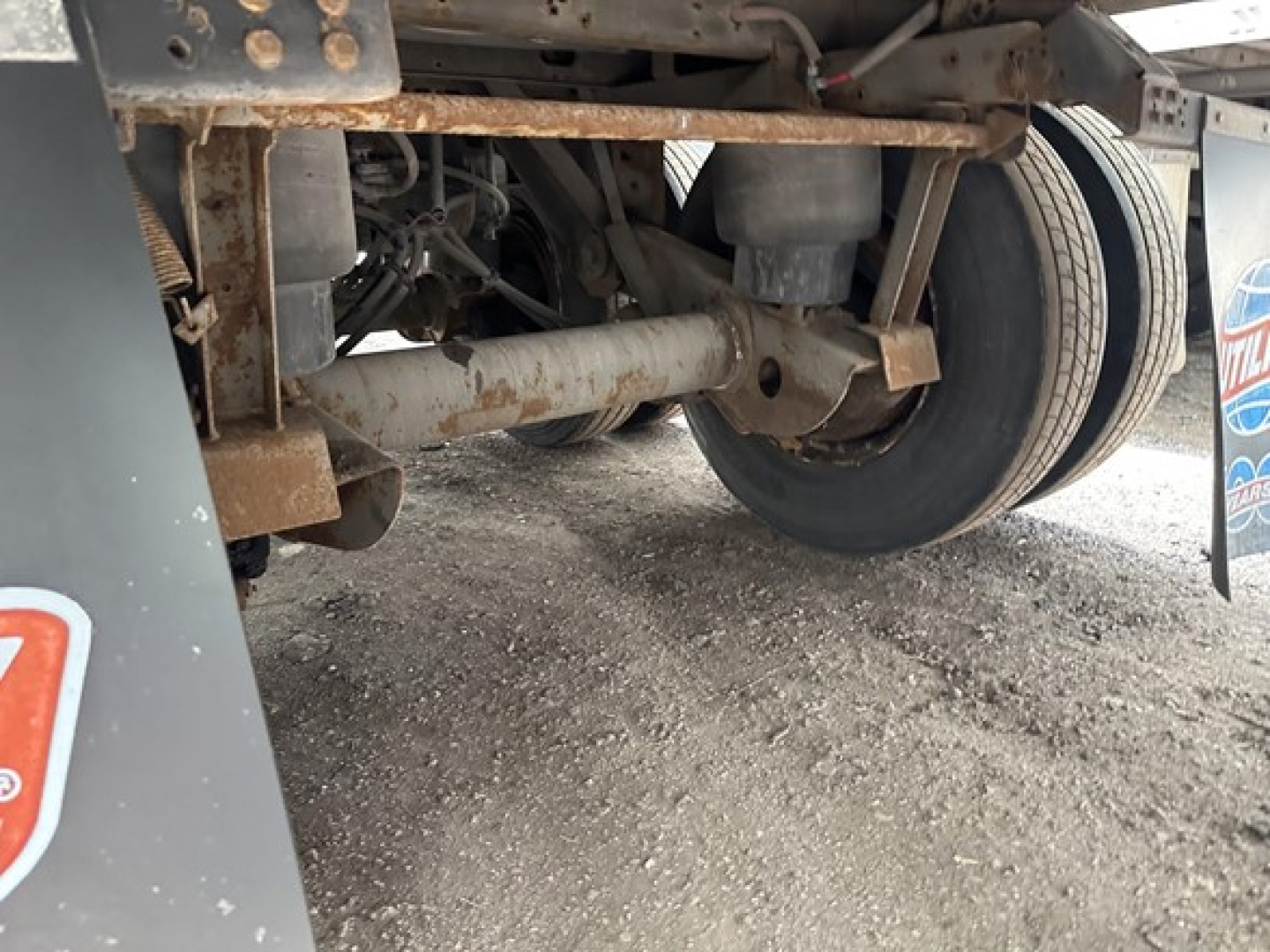 Trailer undercarriage showing suspension and axles of a 2018 Utility 3000R Reefer trailer.