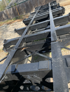 Chassis frame of a 2020 Pro-Haul 43' sand chassis trailer showing steel cross members and structural beams.