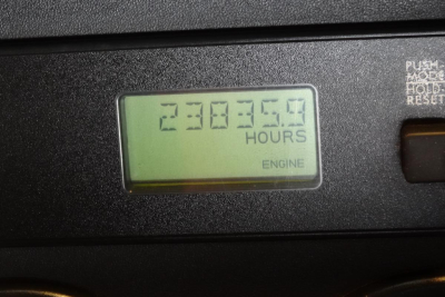 Freightliner Cascadia 125 engine hour meter showing 238359 hours.