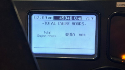 Mack GU Granite instrument display showing total engine hours: 3800 HRS, time 02:09 PM, temperature 71°F, gauge panel.