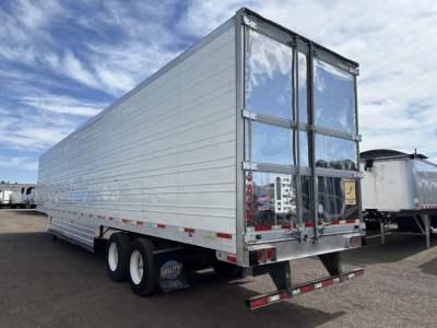Trailer rear and side view of a 2017 Utility 3000R reefer trailer in a used condition, with dual rear doors, aluminum siding, tandem axles, and rear underride guard.