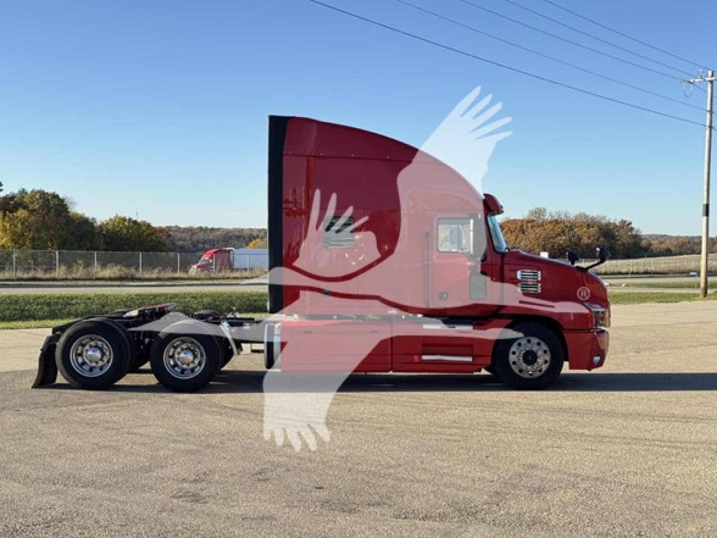 Truck side profile of a red 2019 Mack Anthem 64T tractor with sleeper cab, showing long wheelbase and fifth wheel, stock number 2509127.
