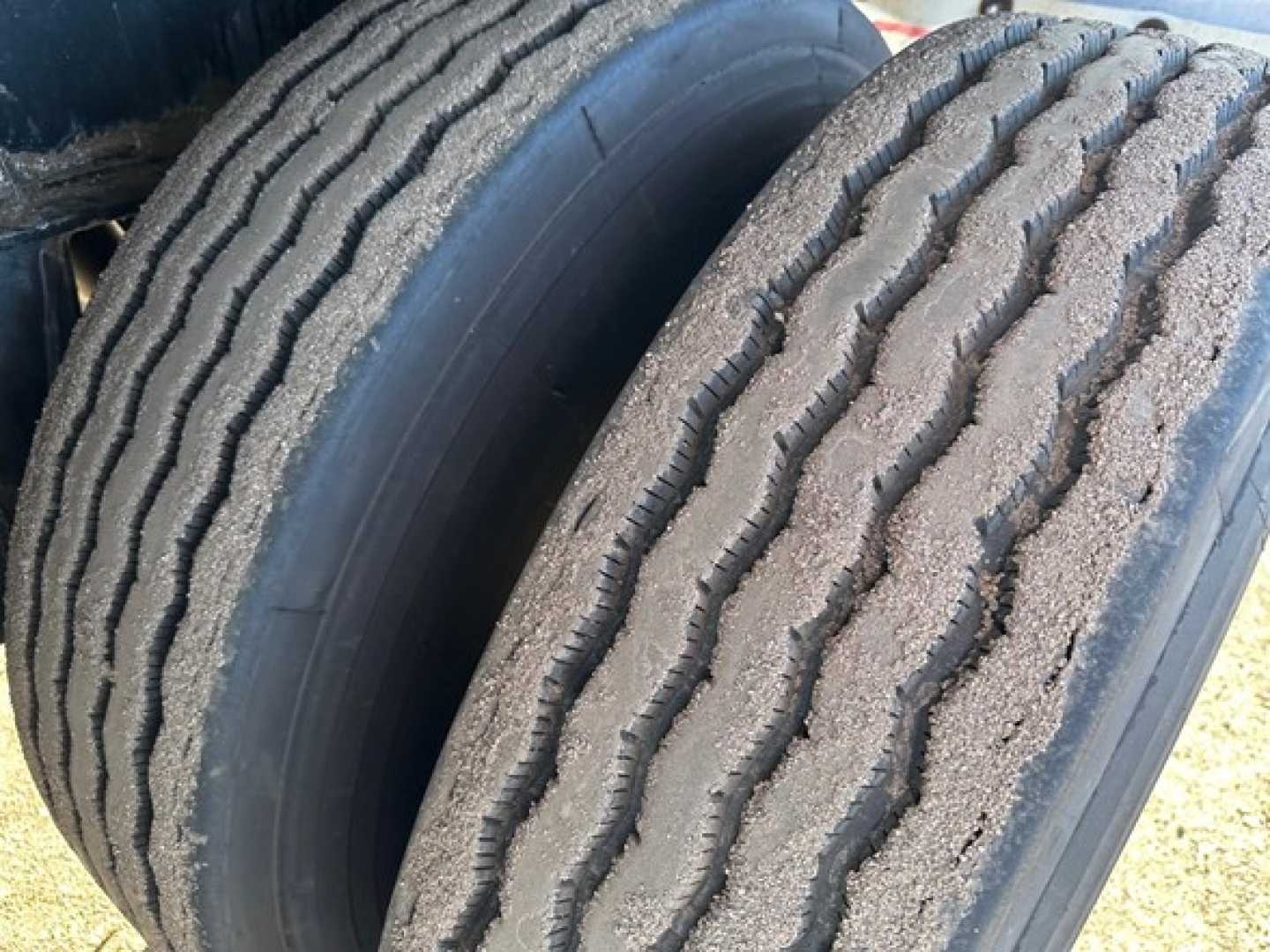 Tires on Fontaine Infinity 48' Combo Flatbed trailer showing tread pattern and sidewall detail (no plate visible).