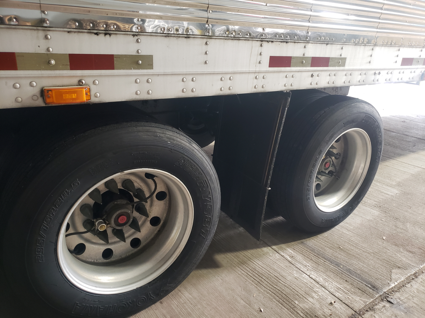 Great Dane 53' dry van trailer showing dual rear axles and aluminum rimmed wheels.