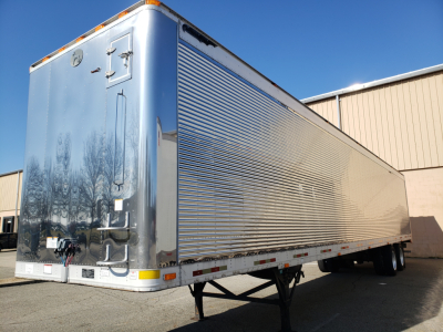 Great Dane 53' dry van trailer side and rear view showing corrugated aluminum exterior and rear doors.