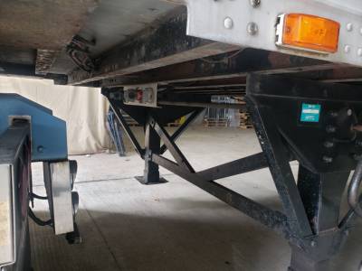 Great Dane 53' dry van trailer undercarriage showing frame rails, support brackets, and rear lighting; undercarriage components and landing gear visible.