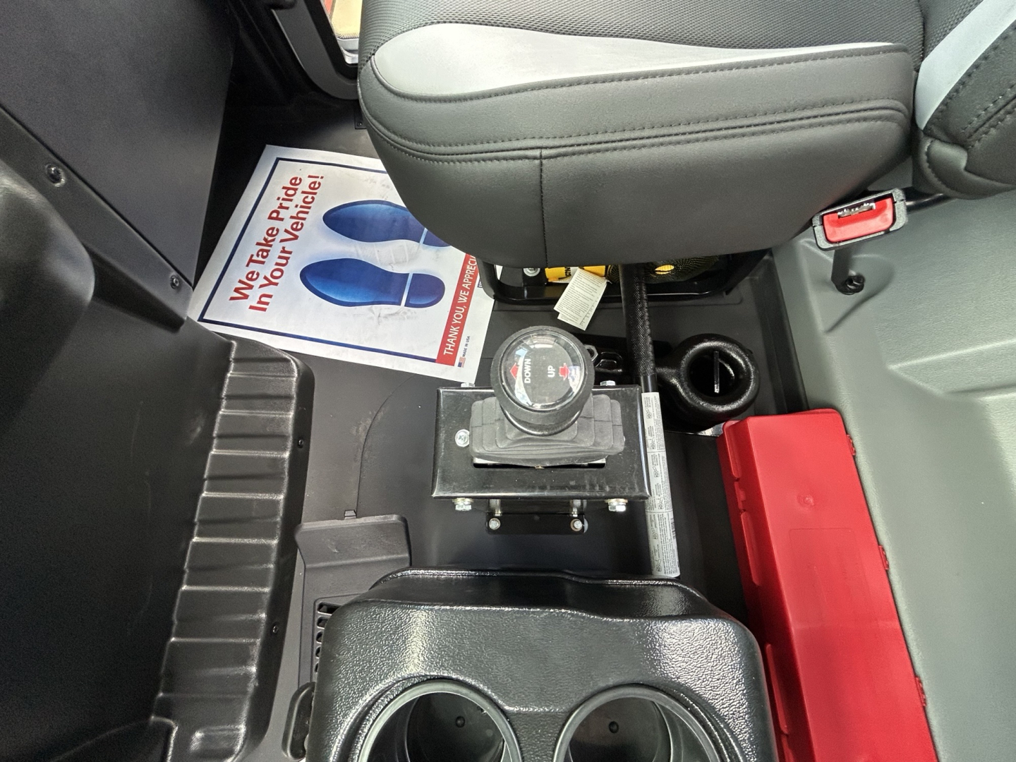 Mack MD6 interior showing center console with gear selector and cup holder.