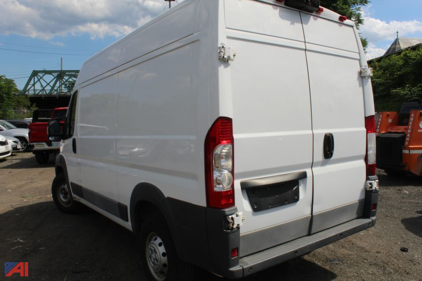 Ram ProMaster cargo van rear view showing panel doors and bumper, white exterior