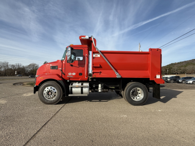 Red Mack MD7 dump truck side view showing dump bed and cab with ladder. VIN 1M2MDBAA0SS077608 and stock number 68178 visible.