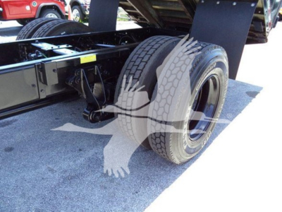 Truck chassis and dual rear tires of a 2019 International Durastar 4300 chassis showing wheel assembly and undercarriage components.