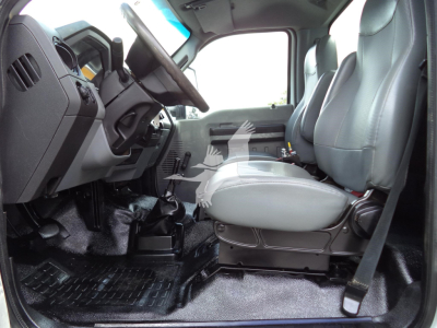 Ford F-650 interior cab front view showing driver and passenger seats and dashboard.