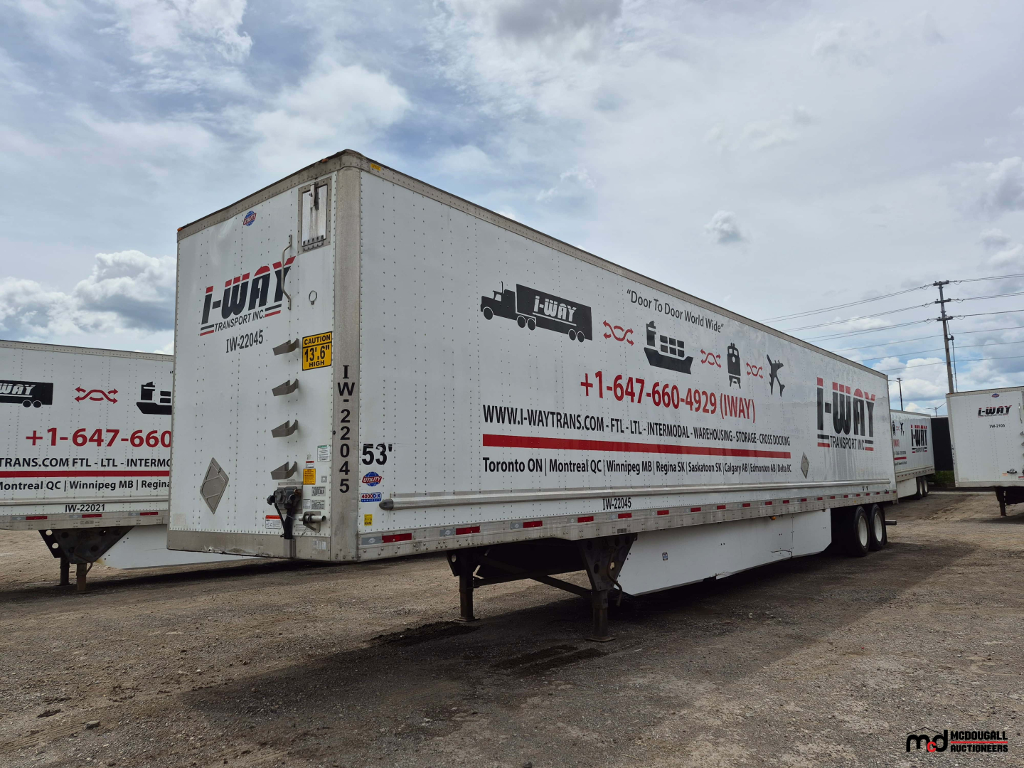 53' dry van trailer showing I-WAY logo and contact details, side graphics, and registration numbers.