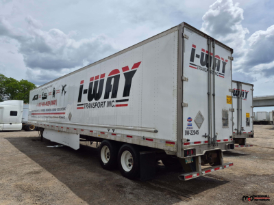Trailer side view showing I-WAY TRANSPORT INC logo and 53' dry van trailer with rear doors and reflective tape.
