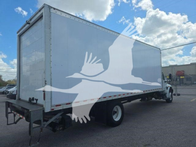Box truck trailer in side perspective showing large cargo area and rear wheels with a watermark across the image