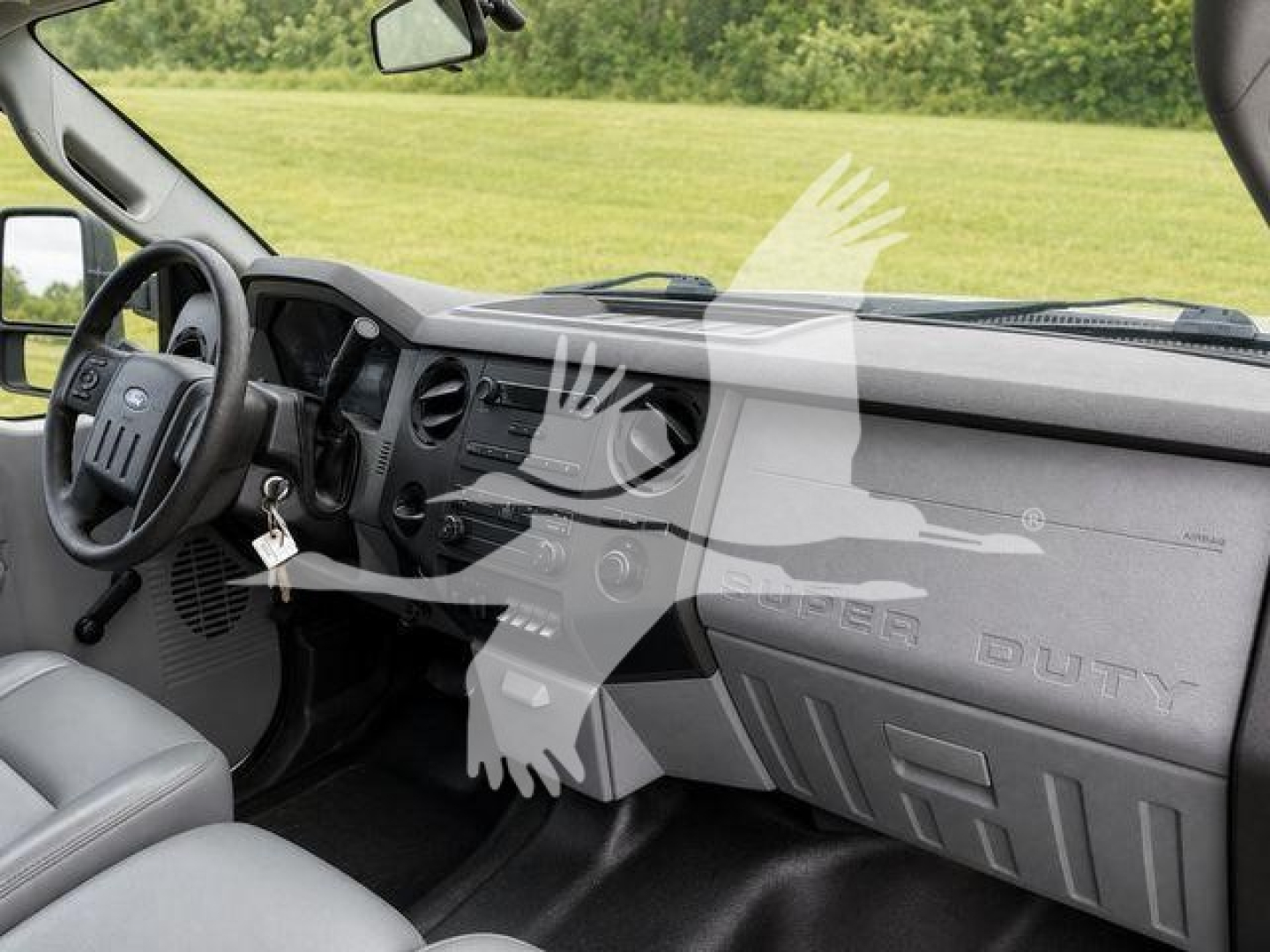 Ford F-350 interior dashboard and steering wheel view.