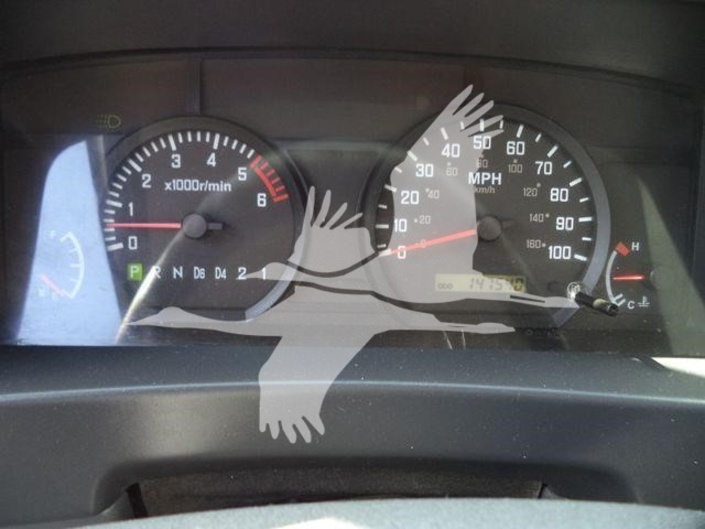 Dashboard of a 2017 Isuzu NPR HD truck showing tachometer and speedometer with gear indicators (P R N D 3 2 1).