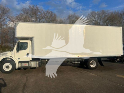 Truck side view showing a white moving van box on a Freightliner M2 106 chassis with plain white exterior.