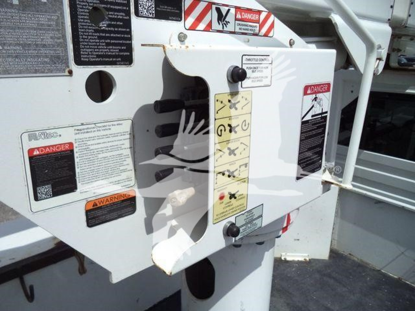 Altec L37M crane control panel area with warning labels and instruction decals visible.