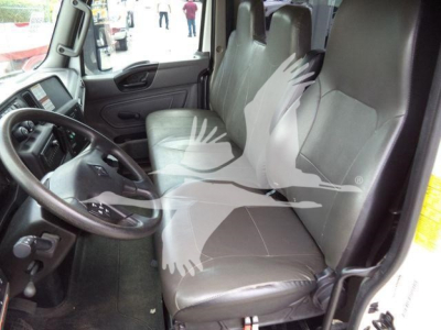 Interior cabin of a 2021 Altec L37M crane showing driver’s seat and passenger seat with steering wheel and dashboard visible.