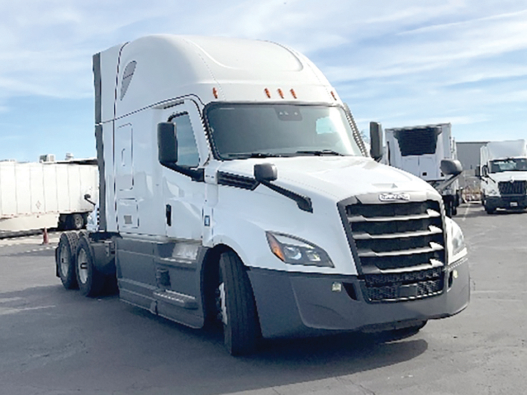 Freightliner Cascadia126 truck in white, front three-quarter view, no visible text on side, classified as a used conventional sleeper.