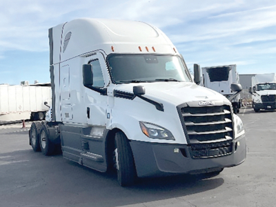 Freightliner Cascadia126 truck in white, front three-quarter view, no visible text on side, classified as a used conventional sleeper.