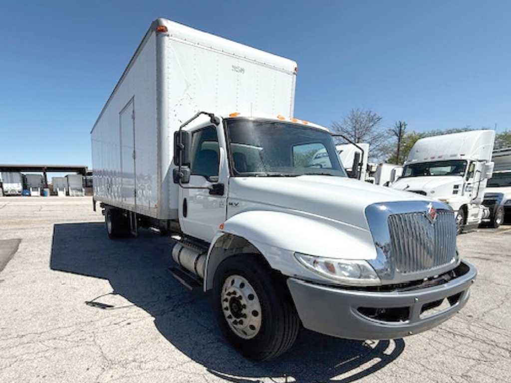 International 4300 box truck in view showing cab and box with VIN and stock number not visible on image.
