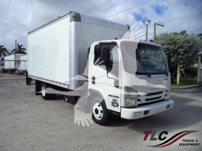 Isuzu NPR HD box truck showing white cab and cargo box with VIN visible and TLc graphic watermark.