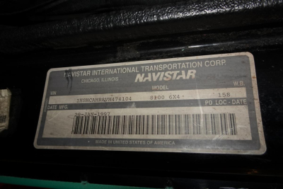 Navistar/Navistar International Corp. plate with VIN 1HSHCAHR8VH474104, stock number 0314251, date 1997, 8100 6x4, MPG label, MADE IN UNITED STATES OF AMERICA.