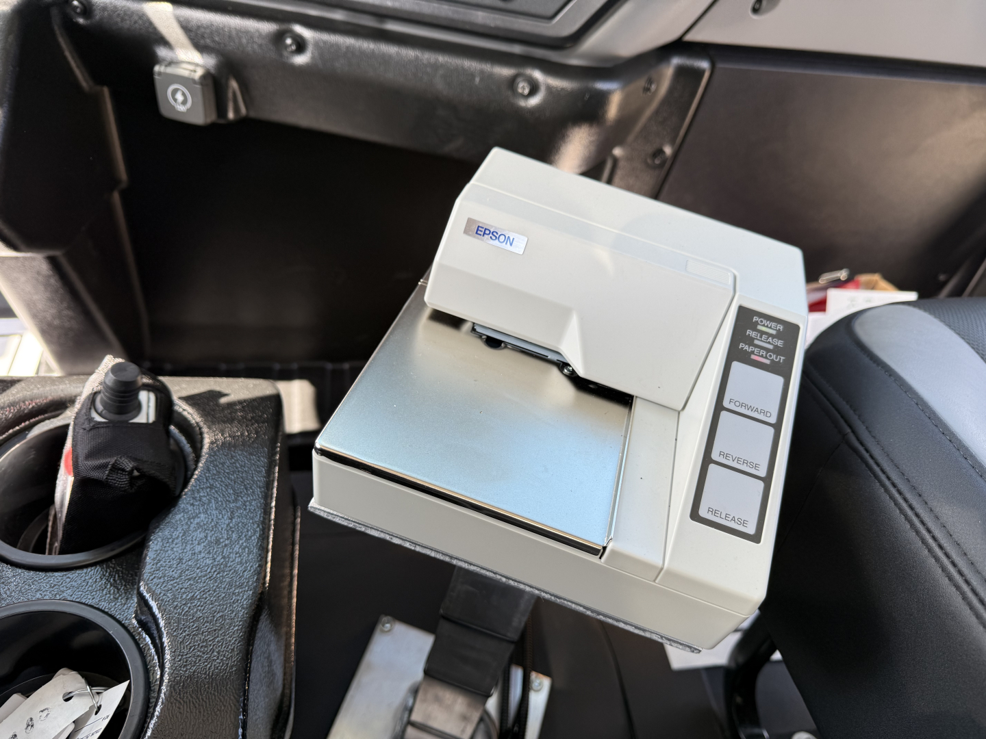 Epson thermal receipt printer mounted in Mack MD7 cab showing card slots and control buttons.