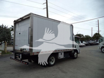 Isuzu NQR box truck rear-side view showing cargo box and taillight area.