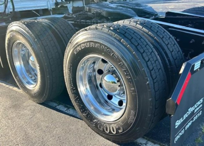 Freightliner Cascadia truck rear dual wheels with Goodyear tires; visible text on tire reads 'ENDURANCE...' and 'GOODYEAR' around rim. No other readable labels visible.
