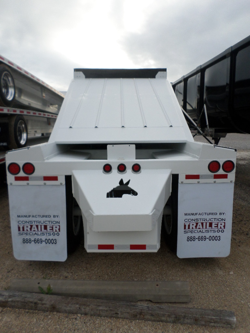 Rear view of white trailer with tailgate and light bar; text on mud flaps reads 'MANUFACTURED BY: CONSTRUCTION TRAILER SPECIALISTS' and phone numbers; central rear features a horse logo; no other readable labels visible.