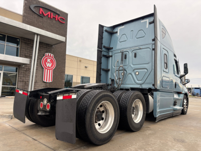 2023 Freightliner PT126064ST tractor rear view showing dual rear axles and sleeper cab with KW filter logo in background.