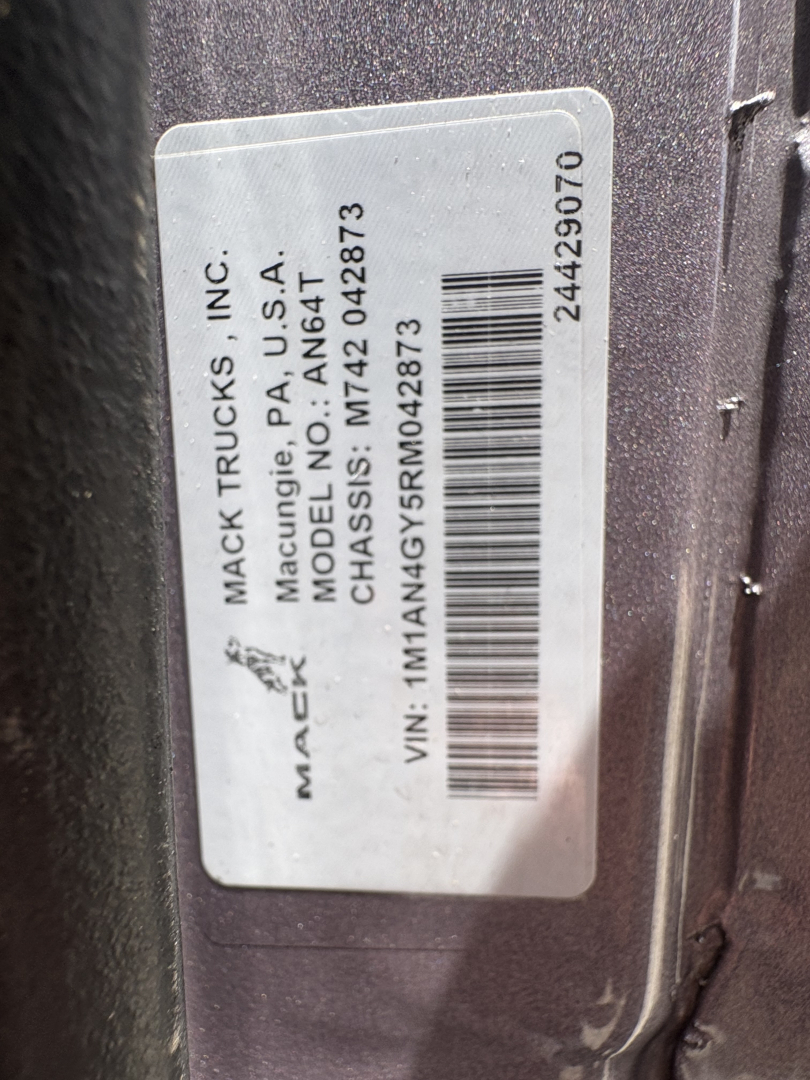 Mack Trucks label on a 2024 AN64T70 showing VIN M1TA... actually reads: MACK TRUCKS INC., MACUNG, PA, USA MODEN,  ... VIN: 1M1AN4GY5RM042873 barcode 24429070 stock number not fully legible. Text: MACK TRUCKS INC., MACUNG, PA U.S.A. CHASSIS: