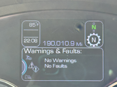 Dashboard display showing 190,010.9 miles, gear indicator N, no warnings or faults, time 22:06, outside temp 85°F, warning icons.