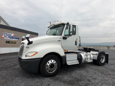 2018 International LT625 conventional daycab truck side view showing diesel fuel tanks and cab details