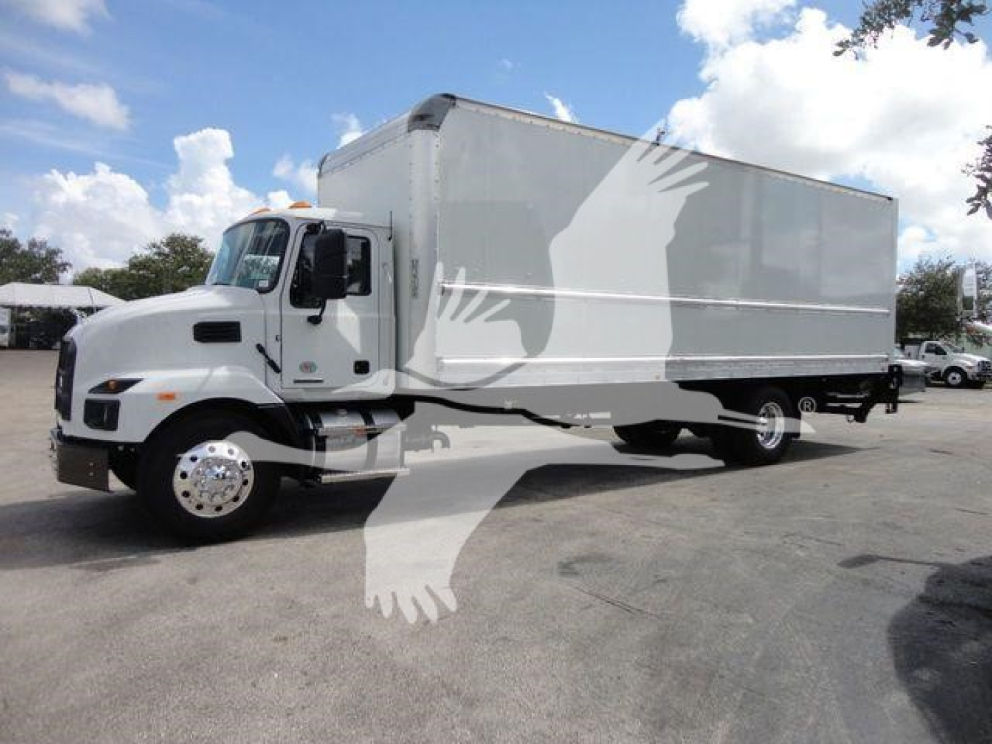 Truck box showing 2026 Mack Md6 box truck with white cab and large cargo area.