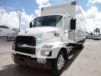 2026 Mack MD6 box truck front-right view showing cab, grille, headlights, side mirrors, and box cargo area.