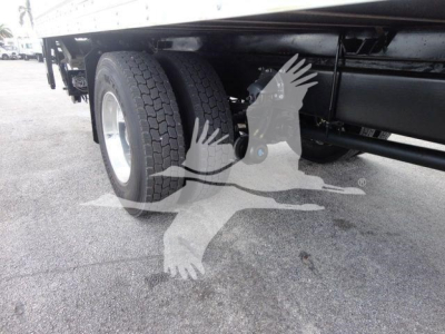 MD6 truck dual rear wheels and undercarriage view showing suspension and frame with tires