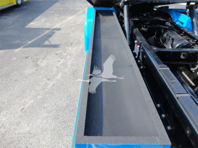 Peterbilt 337 rollback truck side panel and engine bay area with blue accents.